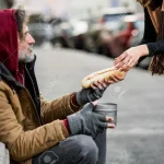 sonhar com mendigo pedindo comida