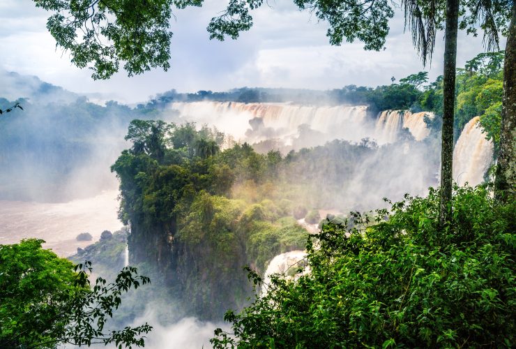 waterfall iguazu national park surrounded by forests covered fog cloudy sky 2