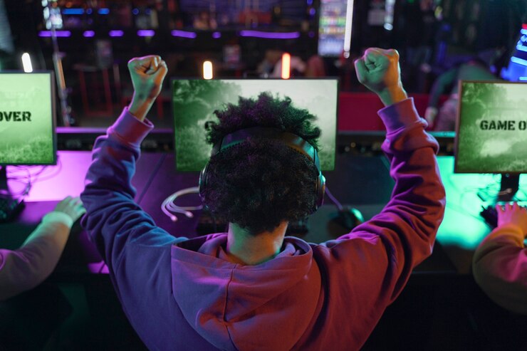 back view man winning videogame 23 2149350002