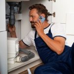 plumbing professional doing his job 23 2150721540 1