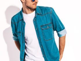 portrait handsome smiling stylish young man model wearing jeans clothes sunglasses fashion man